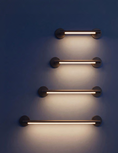 RENO HaloTube architectural sign lights in four lengths illuminating a wall, manufacturer application illustration